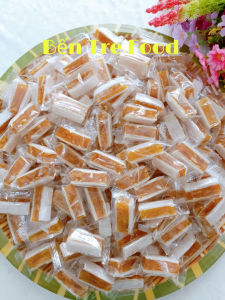 Kẹo khóm dừa non kẹp bánh tráng ít đường mềm dẻo vị chua ngọt