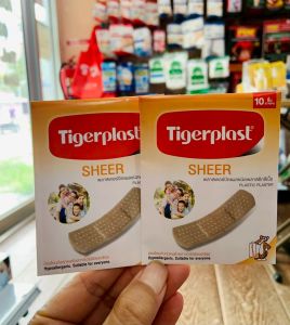 Tigerplast Sheer พลาสเตอร์ปิดแผล พลาสติกสีเนื้อ กาวติดแน่น อ่อนโยน ใช้ดี (2ซอง/ยกกล่อง10ซอง) ราคาถูก