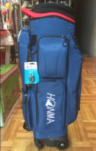 Túi đựng gậy golf Honma và Titleist cover cứng có bánh xe di chuyển dễ dàng khi đi máy bay an toàn và tiện lợi tặng kèm Cover che mưa túi gậy