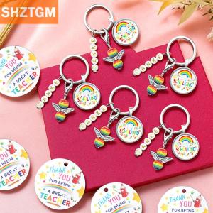 [COD] SHZTGM อำลาของขวัญนักการศึกษา10ชุดพร้อมพวงกุญแจเทวดาผู้พิทักษ์และถุงการ์ดขอบคุณออร์แกนของขวัญอำลาสำหรับครู