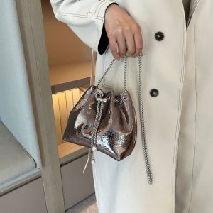 IELGY กระเป๋าทรงถังผู้หญิงฉบับภาษาเกาหลีแฟชั่นห่วงโซ่กระเป๋าส่งสารแบบพกพาเรียบง่าย