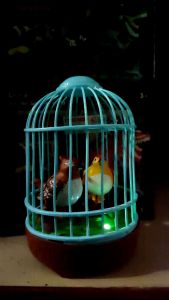 Happy bird mainan burung dalam sangkar sensor tepuk