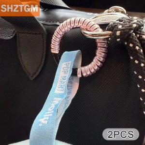 [COD] SHZTGM 2ชิ้น Labu หัวเข็มขัดป้องกันการตกซิลิโคนเชือกพวงกุญแจแหวนป้องกันสีสันม้วนคงที่ป้องกันการตก