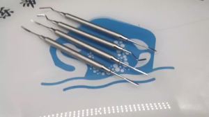 ชุดเครื่องมือตัดเหงือกทันตกรรมพร้อมเครื่องมือตัดเหงือกแบบฟันเลื่อยสำหรับการวางตำแหน่งและปรับรูปร่างของเหงือก