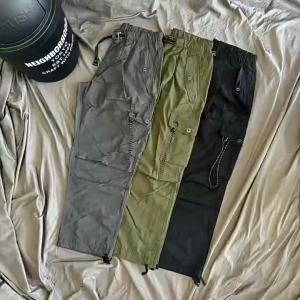 Dropshipping Japanese Trendy Urban Functional AW Reflective Triangle Multi-Pocket Cargo Paratrooper Pants Loose Fit Plus Size