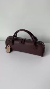 Genuine leather vintage sausage bag 2025 new niche design ins fashion Y2K high-quality cowhide womens simple long handbag