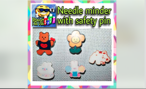 NEEDLE MINDER WITH SAFETY PIN / ACCESORRIES