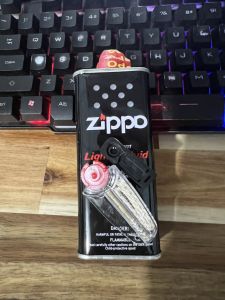 mua 1 tặng 3 - mua 1 xăng 133ml cho bật lửa tặng 1 sợi tim + 7 viên đá + 1 đít nhựa