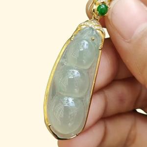 High Quality Good Translucent Light Green Hue Natural Type A Jadeite Jade Crafted as Bean set on 18k gold as Pendant Necklace certificate weighs 6.88 grams (18kp68)