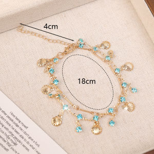 สร้อยข้อมือเพชรสังเคราะห์สีทองประกายระยิบระยับนางเงือกสีฟ้าดีไซน์เฉพาะกลุ่มเครื่องประดับหรูหราน้ำหนักเบาระดับไฮเอนด์