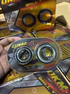 OKM 4R Series Ball Bearings - Metallic Precision High Performance Automotive Motorcycle Use - Packaged in Transparent Plastic with Branding Cardboard Box.