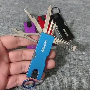 TL141 Multifunctional Nail Scissors Pocket Nail File Folding Key Chain With Scissors Flashlight