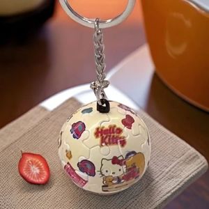 ARTMU การ์ตูนลายการ์ตูน พวงกุญแจปริศนาจิ๊กซอว์ คุโรมิ แมว KT จี้ลูกกลม ตลกๆ จี้ห้อยกระเป๋า ของเล่นปริศนาลูกบอลสำหรับ3D ของเล่นเด็กเล่น