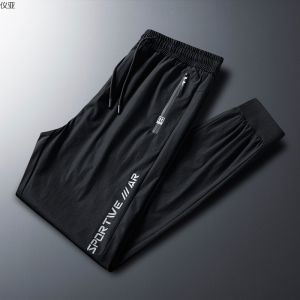 Mens Summer Elastic Trousers Slim Korean Fashion Sports and Leisure Pants Mens Clothing 2020 Ice Silk Breathable Quick-Drying