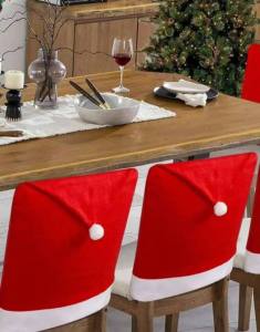 YP RED Christmas Santa Hat  Chair Cover - made of fabric 20x 24 iches made of fabric - not felt paper - decorative - chair cover - excllent quality - fabric from abroad - classy and elegant - for christmas - santa hat chair Price: 399 Sale price: 99 Sku