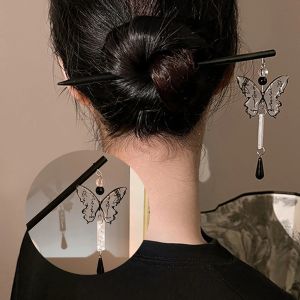 Ancient Chinese Traditional Hair Stick Glaze Hair Clip with Butterfly Calligraphy Design. Black hair stick with butterfly design and dangling beads. Suitable for formal or traditional occasions.