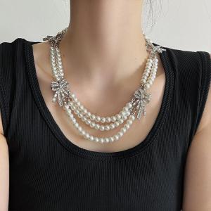 Hmeme ชุดสร้อยคอและต่างหูไข่มุกหรูหราพร้อมโบว์ผีเสื้อสไตล์ฝรั่งเศสย้อนยุคสร้อยคอหลายชั้น