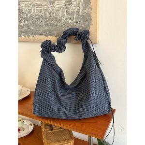 Korean-style vintage plaid canvas bag 2026 New large-capacity drawstring tote bag niche commuter shoulder and crossbody bag