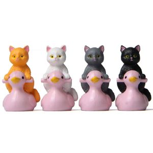 ANIME FAN เรซิ่น DIY ของขวัญเด็ก ตุ๊กตา ของเล่นเพื่อการศึกษา โมเดลสัตว์ เดสก์ท็อป โมเดลพีวีซี เครื่องประดับ แมวจิ๋ว รูปปั้นขนาดเล็ก นั่งแมวเป็ดสีชมพู เครื่องประดับแมว