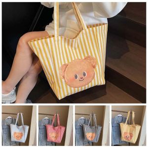 JOYPICKS คาวาอิ กระเป๋าผ้าบัตเตอร์หมี ผ้าใบแคนวาส การ์ตูนลายการ์ตูน กระเป๋าสะพายไหล่ลายหมีสีเหลือง สไตล์ไทย สีเหลืองทาเล็บ กระเป๋าถือพิมพ์ลาย สำหรับผู้หญิง