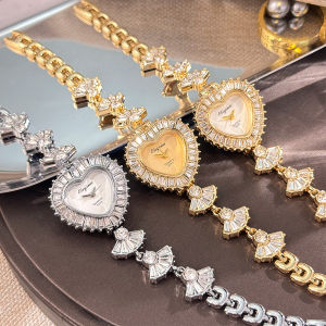 แฟชั่นผู้หญิงนาฬิกาใหม่รักฝังกระโปรงเพทายขนาดเล็กที่เรียบง่ายทันสมัยและประณีตสร้อยข้อมือพรีเมี่ยมผู้หญิงนาฬิกาควอตซ์