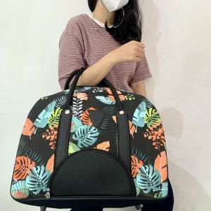Gudang Tas - Tas Traveling - Travel Bag Batik Ukuran Besar - Tas Pakaian Batik Ukuran Besar - Koper Jinjing Kanvas Motif Bunga orange