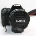 Cover Tutup Lensa Kamera Canon Lens Cap Penutup 67mm 72mm 77mm 82mm Front Cover Tutup Tutupan Pelindung Lensa Depan DSLR Anti Debu Kotoran Lens Protector Kamera Camera Hobi Foto Photo Fotografer Photography s6186 - Black. 