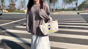 Donald Duck cute cartoon woman fashion new simple portable tote bag large capacity canvas bags