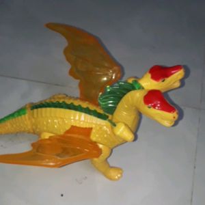 Một mô hình khủng long 4 Đầu kích thước 36x18x16cm chạy pin có nhạc và đèn Led rất đẹp tặng kèm pin