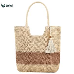 Fashionable Women Tote Bag with Large Straw Woven Body and Tassels for Casual and Holiday Wear