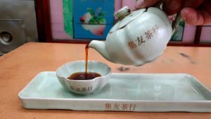 ชาดำ ชาผู่เอ๋อร์ ชาตราสามหอย เซียะกวน 357กรัม (ชาก้อน ผู่เอ๋อ)