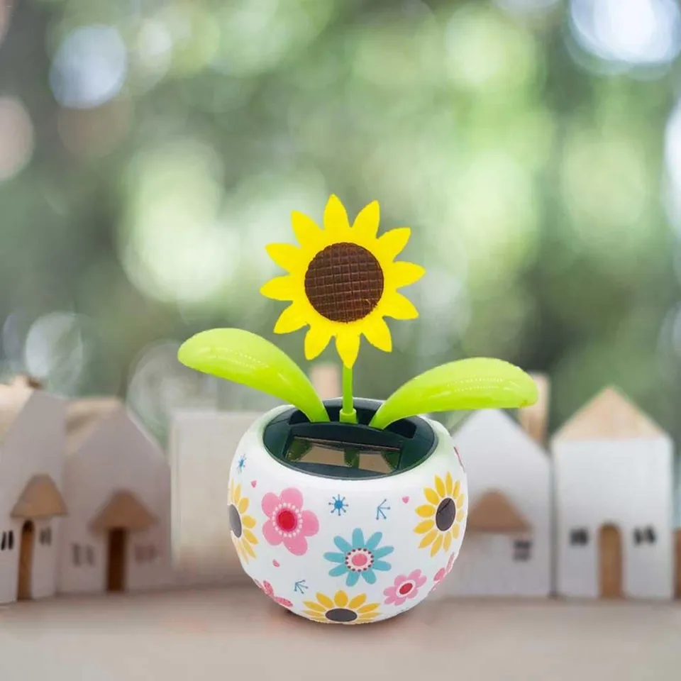 Solar powered sales desk toys