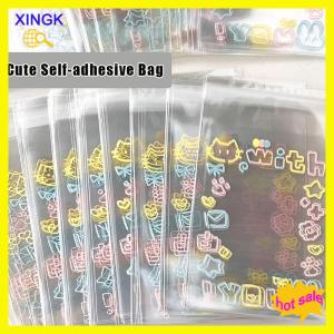 XINGK 50Pcs Transparent Cute Graffiti Kitten Self-adhesive Opp Bag Kpop Idol Photo Cards Protective Storage Bag Photocard Card Sleeves
