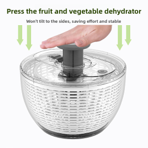 Press the fruit and vegetable dehydration machine. Multi-functional vegetable salad fitness meal wringer. Household draining basket.