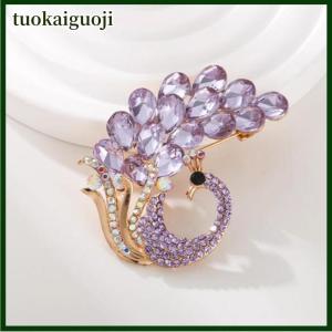 tuokaiguoji เข็มกลัดพลอยเทียมรูปนกยูงสีม่วงคลาสสิกสุดคลาสสิกสำหรับผู้หญิงเข็มกลัดคริสตัลรูปสัตว์หรูหราสำหรับเป็นของขวัญ