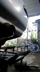 Universal free flow muffler slide tip