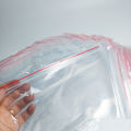 100 Túi Zip Trong Chỉ Đỏ Bấm Miệng - size 34 x 45 cm. 