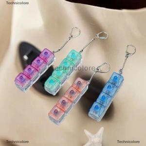 [COD] Technicolore คีย์บอร์ดคลายเครียด1 2ชิ้น กระเป๋าพวงกุญแจเรืองแสงไร้เสียงพร้อมจี้ของเล่นคลายเครียดคีย์บอร์ดสำหรับเล่นเกมของขวัญ