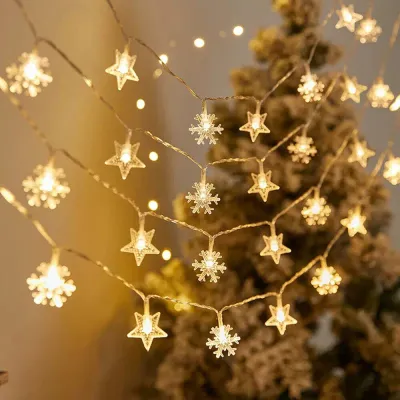 3141) ✨ 20 LED Solar Star & Snowflake String Lights 5M: Waterproof Fairy Lights for Outdoor Garden Christmas Wedding & Holiday Party Decor. 🎄☀️