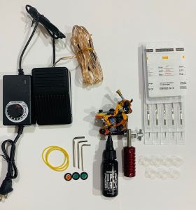 Bộ 1 máy xăm Hoes cho học viên kèm mực xăm lên da