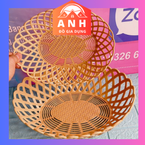 Rổ nhựa giả mây tre đan bầu dục đựng rau củ hoa quả trái cây chưng bưởi.