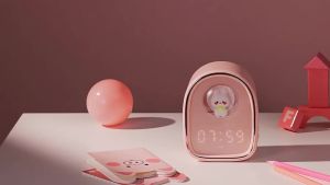NewThe lovely rabbit LED digital alarm clock in the new space capsule the lovely rabbit clock in childrens cartoon the soft light beside the bed and the night light can be charged regularly