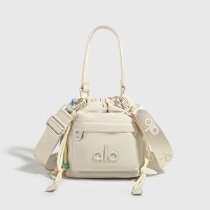 Original ALO Yoga Drawstring Bucket Bag Women NylonCrossbody Bag Wide Strap Cute Handbag with Tassel