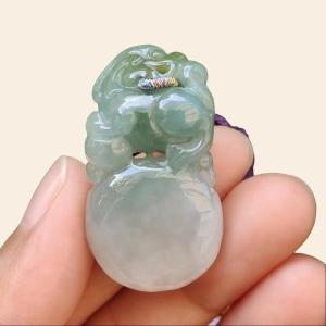 Light Green Natural Type A Jadeite Jade crafted with Lion as Pendant certificate weighs 14.94 grams measurement 36.6 * 20.5 * 10.8 mm (pendant249)