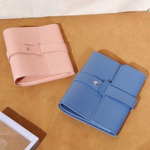 JPTD Multifunctional Earring Layered Jewelry Storage Book Large Capacity Leather Book Design Earring Rack Fashion with Safety Buckle Foldable Jewelry Rolls for Studs Hoops and Pendant Earrings