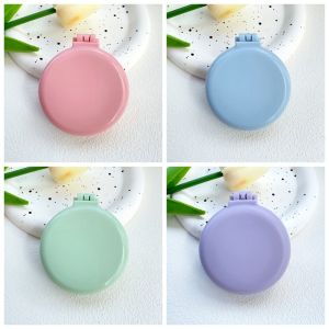 A YAYA 4 4Pcs Mini Gương trang điểm có lược Tròn Sử dụng kép Lược Gấp túi khí Đơn giản Mát xa da đầu Lược đệm khí Nữ