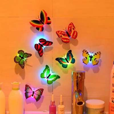 3ชิ้นที่มีสีสันโรแมนติก LED 3D ผีเสื้อไฟกลางคืนบ้านห้องสติ๊กเกอร์ตกแต่งผนังโคมไฟ