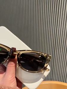 AU Uk Cherry Koko Olive green cat-eye sunglasses for women designed to make the face appear smaller with a sophisticated look perfect for street style photos and sun protection