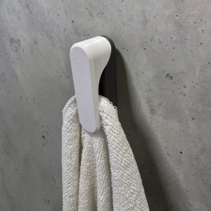 Gravity Towel Holder. Towels can easily slip in and out the holder without damage. Elegant and sturdy.