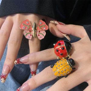 LIHUA รูปทรงเรขาคณิต วงแหวนหยดน้ำมันแมลง อุปกรณ์เครื่องประดับอัญมณี สไตล์เกาหลีแบบ แหวนภาพวาด วินเทจ ผีเสื้อรูปผีเสื้อ แหวนเคลือบหนา คู่คู่กัน